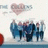 Pixelated image shows a group of figures in blue and dark clothing standing on a light background with a pink heart above them.