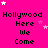 Bright pink background with repeated text "Hollywood Here We Come" in black pixelated font, scattered white and light pink stars.