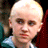 A 48x48 pixel animated contact sheet showing three sequential frames of a character with platinum blonde hair in different outfits and settings, displayed on a gray background.