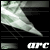 A pixelated arc-shaped object with green and white tones on a black background, featuring partial text 'ARC' in the lower right corner.