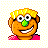 Pixelated cartoon character with orange skin, green nose, yellow hair, and pink shirt against light checkered background.