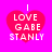 Four identical pixelated heart-shaped icons with 'I LOVE GABE STANLY' text on a bright pink background, arranged in a