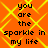 Orange background with yellow diamond lattice pattern and repeated black text "you are the sparkle in my life" in four identical quadrants.