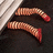 Pixelated image showing two worm-like creatures under a wooden structure with red text reading 'You Better Be good!' and 'Before A Falls on U! House'
