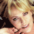 A 48x48 pixel animated contact sheet showing three sampled frames of a celebrity's face in different poses and expressions, arranged in a 2x2 grid with one empty cell.