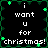 Pixelated text reads "i want u for christmas!" on a black background with green vine-like border elements.