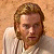 Static pixelated image of a person with light brown hair and beard wearing a white shirt against a beige background.