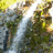 Animated buddy icon with waterfall background displaying text "Alex" then "& Kristen" in white pixelated font.