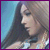 nine identical pixelated images showing a woman with long brown hair in profile, wearing a light-colored top with a necklace, against a blue background with pink text