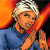 Pixelated image of a person with light-colored hair wearing a blue shirt, hands clasped near the chest, against a gradient background of orange and red hues.