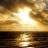 Pixelated static image of a sunset over water with bright central light and reflective surface.