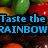 Pixelated image with blue text reading 'Taste the RAINBOW' over a background of colorful fruit shapes.