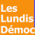 Static orange background with white pixelated text reading "Les Lundis Démoc" in three lines, right edge shows partial blue vertical stripe.