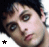 A 49x47 pixel animated contact sheet showing two frames of a person's face with subtle expression changes and star icons in the corners, displayed on a gray background.