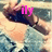 Pixelated image of a person with dark hair holding an object, overlaid with pink text 'ily' on the right side.