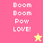Pixelated text 'Boom Boom Pow LOVE!' on pink and yellow backgrounds with a small star icon.