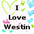 Pixelated graphic with black text "I Love Weston" surrounded by green, blue, pink, and cyan heart shapes on a white background.