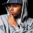 Pixelated image of a person in gray hoodie and dark cap with hand near chin, next to text 'SEXii <3' on black background.