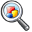 Pixelated magnifying glass with metallic frame and handle, lens showing red yellow blue shapes on light background.
