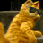 A pixelated golden cat with a wide open mouth and raised paw against a dark background, rendered in a low-resolution style with visible pixelation.