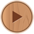 Circular wooden-textured icon with a brown play triangle symbol centered on a light brown background.