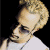 A pixelated contact sheet showing two frames of an animated icon featuring a person with blonde hair and green text reading "Original Icons .com" on a dark background.