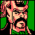 Pixelated static icon of a bearded man with glasses and long hair, wearing a black outfit against green background elements.