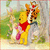 Animated Winnie the Pooh and Tigger embrace in a forest setting with text 'POOH BEAR' on the right.