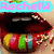 A close-up of lips with rainbow-colored stripes and scattered white dots, overlaid with pink text on a light blue banner.