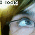 A pixelated close-up of a person's eye with glasses, showing text fragments 'I look', 'for', 'you', and 'crowds' in different frames.