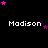Pixelated text 'Madison' repeated across a black background with scattered pink and purple stars, some appearing in motion.