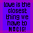 Pixelated text on a purple background with red lines, displaying 'love is the closest thing we have to magic!' in black block letters