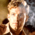 Static 50x50 pixel icon of a person with light brown hair and closed eyes, rendered in low-resolution pixel art style with warm color palette.