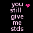 Pixelated text 'you still give me stds' in light pink on black background with animated pink heart and dot patterns.