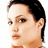 Pixelated static image of a person's face with short dark hair, visible from the shoulders up against a white background.
