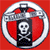 Static pixel art icon featuring a skull inside a black rectangular frame with red side panels, enclosed in a silver circular border on a solid red background.