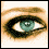 Four pixelated show close-ups of a person's eye, lips, and face with orange lipstick and green eyes