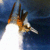Pixelated static image of a stylized space craft with orange and brown accents against dark blue background, appearing to move leftward on white trail.