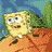 Pixelated cartoon character with yellow sponge texture, white shirt, and brown pants on orange rock against blue water background.