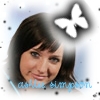 A static icon shows a person with dark brown hair and bangs, a white butterfly graphic above the head, and blue text at the bottom.