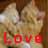 A pixelated image shows two figures in close proximity with the word 'Love' displayed prominently at the bottom in red block letters.