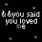 Black background with white pixelated text reading "& bbyou said you loved me" repeated in four quadrants, surrounded by small heart shapes.