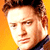 A 50x50 pixel animated contact sheet showing three frames of a character with brown hair against an orange background, alongside text reading "CoolBuddy.com" on a blue background in the top-right frame.