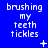 Blue background with white pixelated text reading 'brushing my teeth tickles' in a , featuring small animated symbols like plus signs and dots