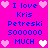 Pixelated text and heart symbols on a bright pink background with blue text and alternating light pink and white hearts.