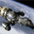 A pixelated image of a metallic robot figure on the left, with a blue digital interface and text elements on the right, and yellow 'FIREFLY' text at bottom.
