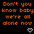 Orange text repeats 'Don't you know baby we're all alone now' across three with white pixel hearts below each phrase on a black background