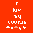 Red background with white pixelated text reading "I luv my COOKIE" and five star-like symbols below, where the third symbol is light pink.