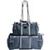 A pixelated dark blue rolling suitcase with a silver telescopic handle, viewed from a slightly elevated angle against a white background.