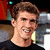 A four- shows a person in black clothing against a blurred background with red and gray elements; the top-right displays blue text reading "Michael Phelps is a HOTTIE"